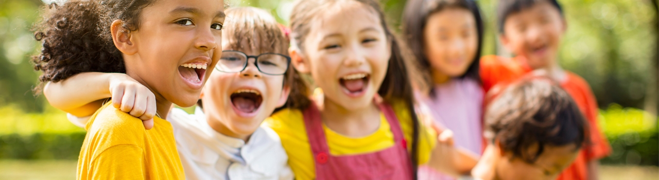 image of a group of children hangin out together and laughing